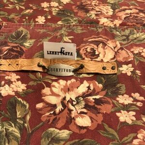 Leather bracelet with 'SURVIVOR' sentiment by Lenny & Eva